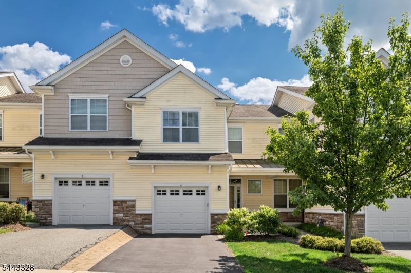 Welcome to this immaculate Hillcrest Model Townhome in the highly desirable Panther Valley Community, offering breathtaking views and a move-in ready lifestyle!  This beautifully maintained home features 3 spacious bedrooms, 2.5 baths, and an open-concept floor plan that's perfect for both everyday living and entertaining.  The stunning kitchen boasts granite countertops, a center island, handsome cabinetry, stainless steel appliances, and sliders leading to a private deck where you can relax and enjoy the scenic surroundings. The kitchen flows seamlessly into the dining  area and inviting living room, creating an  ideal gathering space.  The finished walkout lower level offers exceptional additional living space with a spacious family room,  recreation room, storage area, and brand-new luxury vinyl plank flooring.  Additional highlights include a one-car garage, natural gas heat, central air conditioning, and public water and sewer. Enjoy all that Panther Valley has to offer, including three swimming pools, tennis courts, basketball courts, golf, playgrounds, hiking paths & 24/7 security,  and beautifully maintained grounds.  Conveniently located just minutes from major highways, shopping, restaurants, and schools, this exceptional home combines comfort, convenience, and resort-style amenities in one outstanding package.  Capitol Contribution to POA to be paid by buyer @ closing $550 (1/10 of 1% of purchase price). Buyer to confirm amount with POA.   QUICK CLOSING AVAILABLE!