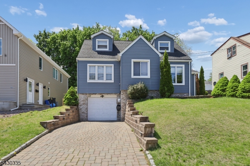 Welcome to this well-maintained 4 bedroom, 2.5 bathroom home offering a functional layout and great indoor and outdoor living space. The first floor features a welcoming foyer, spacious living room, dining room, kitchen, 2 bedrooms, and a full bathroom. Upstairs offers 2 additional bedrooms and a full bathroom. The finished basement provides additional living space, laundry area, another bathroom, and plenty of storage. Step outside to enjoy the beautiful backyard complete with a gorgeous deck and outdoor kitchen, perfect for entertaining. Additional features include an attached one-car garage and driveway parking.