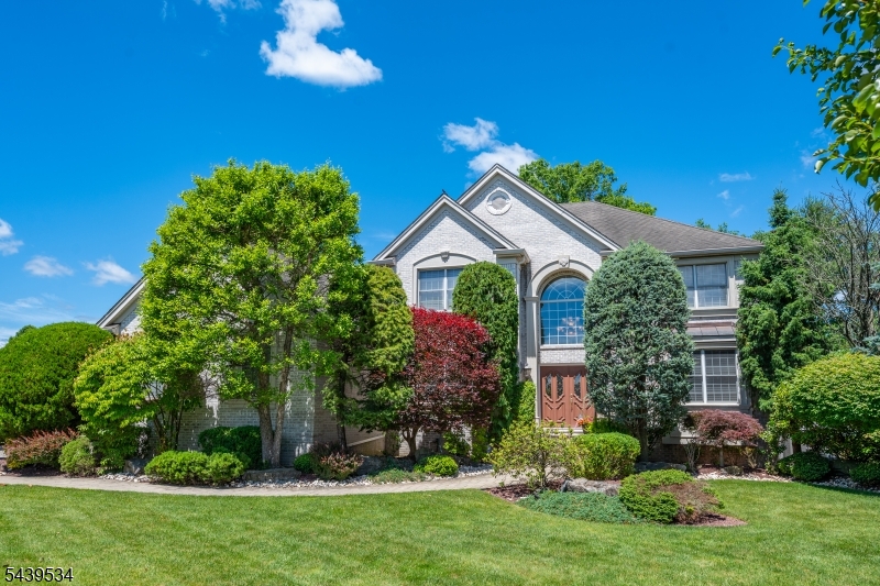THIS STATELY FOUR BEDROOM ,2.5 BATH BRICK COLONIAL OFFERS TIMELESS CHARM & EXCEPTIONAL SPACE FOR BOTH EVERYDAY LIVING & ENTERTAINING. WELCOMING FLOOR PLAN FEATURES A LARGE EAT IN KITCHEN W/A SUNNY BREAKFAST AREA WHICH IS HIGHLIGHTED BY A COZY 2 SIDED FIREPLACE THAT OPENS SEEMLESSLY TO THE ADJOINING LIVING RM CREATING WARMTH & AMBIANCE THROUGHOUT. FRENCH DOORS LEAD TO A SPACIOUS 2 TIER DECK PERFECT FOR OUTDOOR DINING,RELAXING OR HOSTING GATHERINGS.THIS HOME ALSO OFFERS AN ELEGANT FORMAL DINING ROOM FOR SPECIAL DINNERS.DESIGNED WITH ENTERTAINING IN MIND THIS RESIDENCE INCLUDES A CUSTOM BAR AREA TO UNWIND OR WATCH SPORTS. UPSTAIRS 4 WELL PROPORTIONED BEDROOMS OFFER COMFORT & PRIVACY,INCLUDING A SPACIOUS PRIMARY WITH BEAUTIFUL JACUZZI BATH & WALK -IN CLOSET. THE MASSIVE UNFINISHED BASEMENT PRESENTS ENDLESS POSSIBILITIES FOR FUTURE EXPANSION,STORAGE, HOME GYM OR CUSTOMIZED RECREATION SPACE. THIS BEAUTIFUL BRICK HOME OFFERS THE PERFECT BLEND OF ELEGANCE,COMFORT & FUNCTIONALITY.