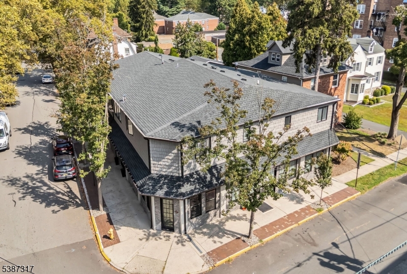 Prime investment opportunity in the heart of Bloomfield, NJ! This fully renovated, 7000 square feet commercial building offers a versatile mix of residential and office spaces. Featuring three spacious two-bedroom units and three comfortable one-bedroom units, each with separate utilities, this property is designed for maximum tenant convenience and simplified management. Two modern dedicated office spaces provide excellent potential for professional or small business use. The building has been thoughtfully updated, blending clean finishes with functional layouts. Tenants will appreciate the ample on-site parking, a rare and valuable feature in this location. Situated just one block from the Glen Ridge train station, commuters enjoy effortless access to New York City and surrounding areas. Additionally, the property is moments from Bloomfield Avenue, offering a vibrant mix of dining, shopping, and local amenities. Whether you're seeking a strong cash-flowing asset or a live-work investment option, this property delivers. Its combination of residential units, professional office spaces, and prime location near transit and downtown attractions makes it a standout in the Bloomfield market. Don't miss your chance to own a turnkey investment in a highly desirable neighborhood with excellent growth potential.