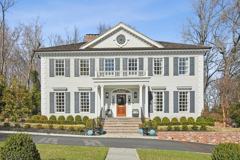Spectacular custom built 5BR/5.1 bath center hall colonial situated on a private road on the North Side of Summit. Extensive renovations and expansion completed in 2022 offering the ultimate luxury on all three levels of living space. Quality craftsmanship found throughout the interior with high end finishes, in addition, the elegant curb appeal features a circular driveway, grand front entrance, beautiful lush landscaped grounds, blue stone patio/outdoor kitchen and offers complete privacy as it backs up to Reeves Reed Arboretum. A true showcase home!