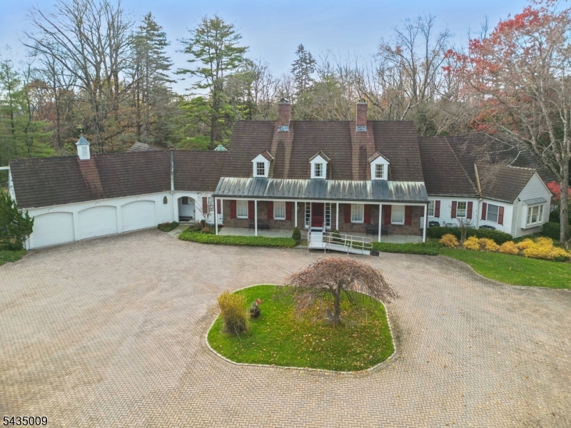 For Comp purposes ONLY. Sold in "AS-IS" condition. This  home is the ultimate in privacy. It is ideally located on a very private, stunning, flagpole lot you can not see from street, on most sought after street in Short Hills! It is an expansive 2.25 acre property surrounded by mature landscaping with pool, and there is plenty of room for putting green and/ or a tennis court. It is in Historic District, but not a designated Historic Hartshorn Home.