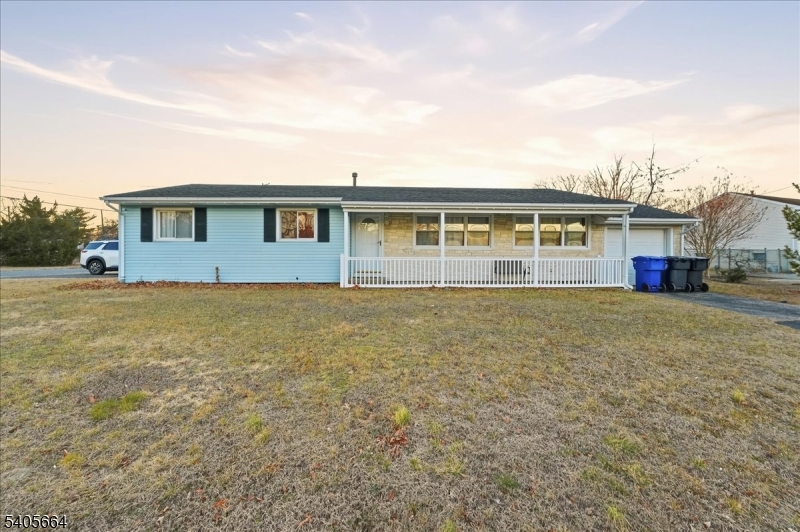 Experience the comfort of this well-cared-for 3-bedroom ranch, set on a generous corner lot. The outdoor space features a deck and fully fenced yard, perfect for unwinding or hosting guests. Inside, the home offers a practical and welcoming layout with a cozy living area, a dedicated dining room, and a full bathroom. The kitchen is conveniently paired with an adjoining laundry room. Ideally located near shopping, beaches, and major highways, this home blends everyday comfort with easy access to everything you need.