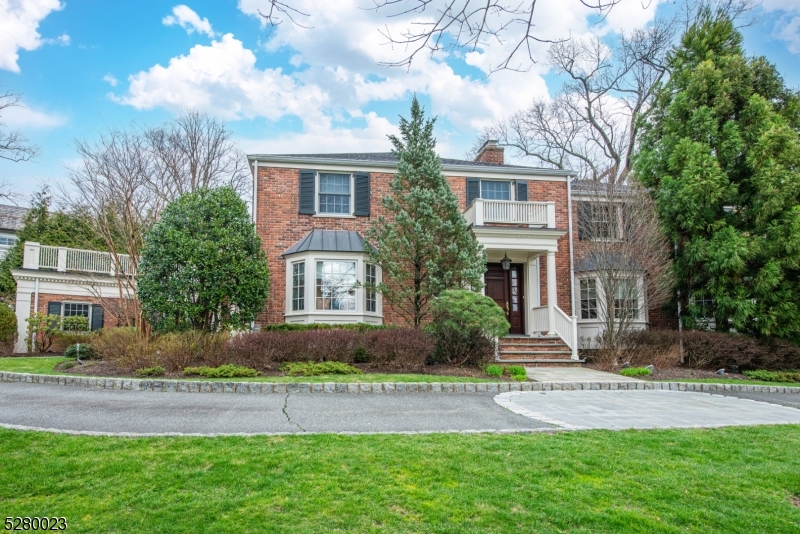 Step into luxury with this expansive seven-bedroom, five-and-a-half-bathroom brick colonial home, featuring a finished basement for added living space. Beyond its grand circular driveway lies a meticulously decorated interior, where every detail has been carefully considered. The updated kitchen is a chef's dream, while outside, the backyard oasis awaits with a built-in BBQ perfect for entertaining on warm summer evenings. Don't miss the chance to call this exceptional property your own. We look forward to welcoming you home.