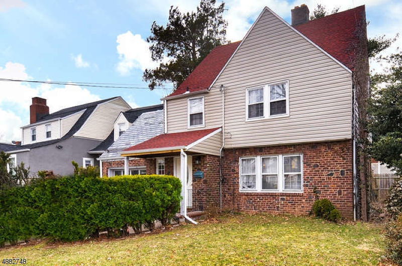 Come check out this beautifully updated home in the heart of the Historical East Side Park District! Formal dining room, living room w/ fireplace, full basement and walk-up attic. Enclosed sunroom off the kitchen area, hardwood floors, partially finished basement, and more. Seller has all the materials to finish the attic and create a great space for recreation or an incredible master bedroom.