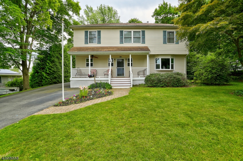 Charming lemonade porch welcomes you to this 4 bedroom colonial with 3.5 bathrooms. Meticulously maintained! Eat-in kitchen, living room with gas fireplace opens to den area for relaxation. Walk up to the second level with master suite walk in closet and master bath! Plus 3 additional bedrooms and full main bath. Second floor addition done 2001, plus laundry! Finished basement with family room and office, half bath. This is a beautiful home in a great neighborhood. A pleasure to show! Over 3000 square feet!