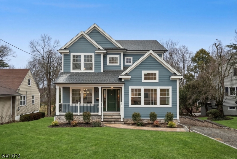 49 The Fellsway - an exquisite new construction home built w/care & precision by the highly respected Lefko Brothers, renowned family owned builders w/a reputation for perfection - charming front porch greets you - enter into a large foyer flanked by formal living room & dining room w/plenty of space for your next dinner party - pinterest worthy butler's pantry w/wine fridge - private first floor guest suite for out of town visitors - kitchen is a chefs masterpiece - extra large 4 stool center island is the heart of this home - high-end appliances - bertozzoni gas range - gorgeous range hood - custom cabinetry - premium finishes - bespoke hardware - detailed millwork & wood flooring throughout - spacious light filled family room w/gas fireplace create a warm & inviting space for relaxing evenings - upstairs are 3 large sunny bedrooms - spa like hall bath & ensuite bath - large closet space - convenient second floor laundry room w/sink - elegant primary suite has soaring ceiling w/custom millwork & luxury lighting - large spa like bathroom w/dual sink vanity & wet room soaking tub & oversize shower - spacious walk in closet - lower level finished walk out basement is functional & adds tremendous living space to the home - convenient mud room near entry door - plentiful space in recreation room for games, play space or homework - bedroom and full luxury bath - New Providence is a quick train ride to NYC with highly rated schools and lovely downtown area - Welcome Home!