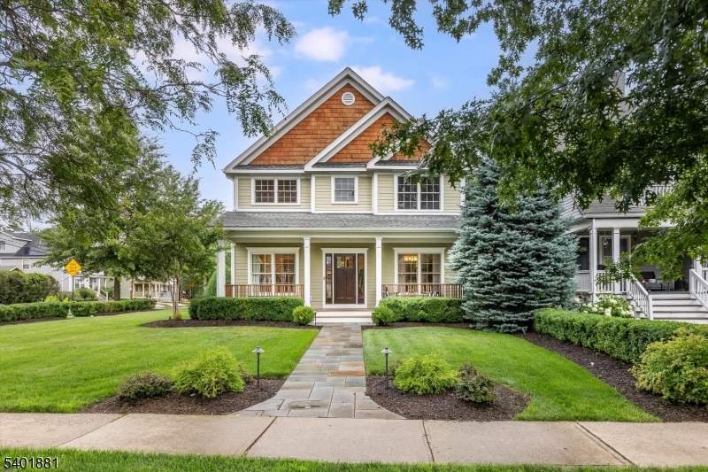 Live the Montclair lifestyle at its very best at One Central Ave!  A perfectly placed newer Colonial home, so close to Walnut Street and downtown Montclair cafe's, NYC Direct Train, Farmer's Market, Soccer Dome, shops and more. First level includes a high-end kitchen with island, SS appliances, 2-wall ovens, Sub-Zero refrigerator, 5 burner stove top, granite countertops, pantry, dry bar open to great room with wood burning fireplace. Formal dining room, liv room, mud room, powder room complete the first floor. Second level includes a primary bedroom with 2 walk in closets, large ensuite bath, 3 additional bedrooms and laundry room. Large basement has high ceiling and lots of room for exercise, play, sleep overs or movie night! Outdoors is a welcoming front porch and back patio with fire pit and private yard. Special features include: coffered ceilings, hard wood floors, beautiful molding, large closets, attached over-sized 2 car garage, beautiful landscape and sprinkler system, Don't miss this one!