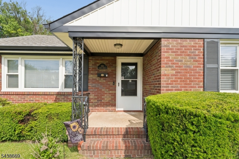 Welcome home to this beautifully updated, move-in-ready ranch offering comfort, style, and exceptional functionality throughout. From the moment you arrive, you'll appreciate the outstanding curb appeal and inviting atmosphere. The spacious interior features hardwood floors, custom oversized closets, abundant storage throughout, central air conditioning, and a stunning renovated kitchen complete with a pantry and modern finishes. The fully finished basement provides abundant additional living space and even more storage options, perfect for recreation, a home office, or entertaining. Outside, enjoy a fully fenced backyard with a patio ideal for relaxing or hosting gatherings. Car enthusiasts and hobbyists will love the oversized, updated two-car garage. Additional upgrades include a tankless water heater for energy-efficient, on-demand hot water. Ideally located just minutes from the train station with direct service to New York City, offering exceptional convenience for commuters. This turnkey home combines modern updates with everyday convenience simply unpack and enjoy! Home qualifies for special financing!