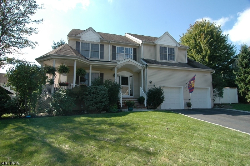 WELCOME HOME TO THIS BEAUTIFUL COLONIAL SITUATED ON A TREE LINED YARD W HEATED IN GROUND POOL ON CUL DE SAC W REMODELED KITCHEN, 2 STORY FOYER, FULL FINISHED BASEMENT W SAUNA & RENOVATED BATHS THIS HOME HAS WOOD FLOORING THROUGHOUT, GAZEBO STYLE FRONT PORCH, SWAROVSKI CRYSTAL LIGHTING, SPACIOUS FORMAL LIVING & DINING ROOMS, FAMILY ROOM WITH FIREPLACE AND MASTER BEDROOM SUITE COMPLETE WITH TWO HUGE WALK IN CLOSETS, DRESSING AREA & LUXURY BATH. PUBLIC UTILITIES HERE! CONVENIENTLY LOCATED MINUTES TO ROUTES 80, 46, 10 & 206, TRAIN STATION, PARK, SCHOOLS, SHOPPING AND RESTAURANTS. THIS HOME WILL WOW THE FUSSIEST BUYER; A MUST SEE!