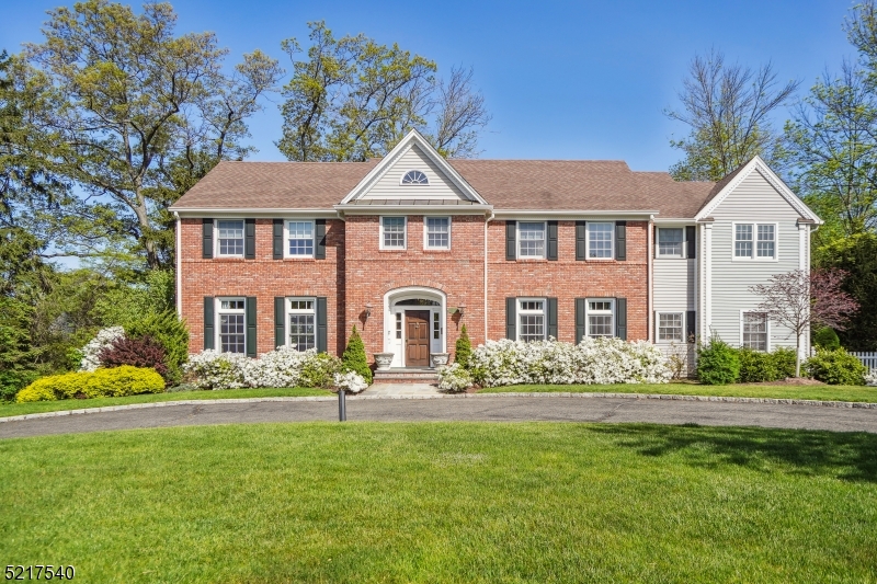**For Comparable Purposes Only** Custom built 6 bedroom, 5.2 bath Brick front Colonial with lovely curb appeal in the heart of the coveted Fairfield Section. Open floor plan, beautiful moldings, trim work, hardwood floors, spacious rooms. Expansive deck off the kitchen. 1st floor in-law suite.  Fabulous primary suite with two walk-in closets, spa-like bath and access to balcony.  Finished walk-out lower level with exercise room, wine cellar, and large rec room with tons of storage. Circular driveway with 3 car garage. Completely fenced in level backyard!