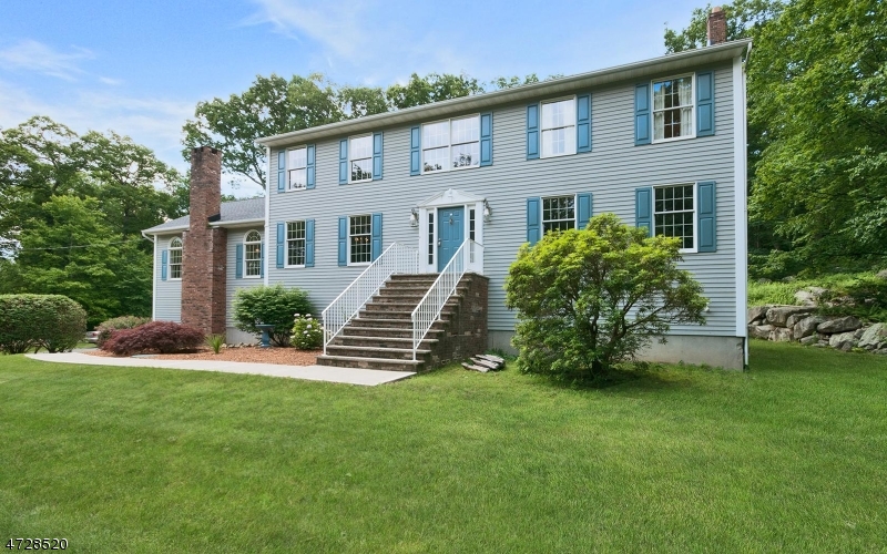 Spacious 5 bedrooms, 3 full baths Colonial with great flow on 5.17 acres. Welcoming tiled entry foyer with skylights, vaulted ceiling, & palladium windows. A glass door leads to the newer deck with plenty of room for outdoor dining. Kitchen features solid oak cabinets, ample storage space, a center island, and breakfast area / sunroom. A full bath and bedroom/office complete the main floor. Arched ceilings in master bedroom, en-suite bath with double sinks. Walk-in closet is accessed through the master bath. 3 additional bedrooms share a full hallway bath, also with double sinks. A laundry room is on this floor. Option to have master bedroom on first floor.
