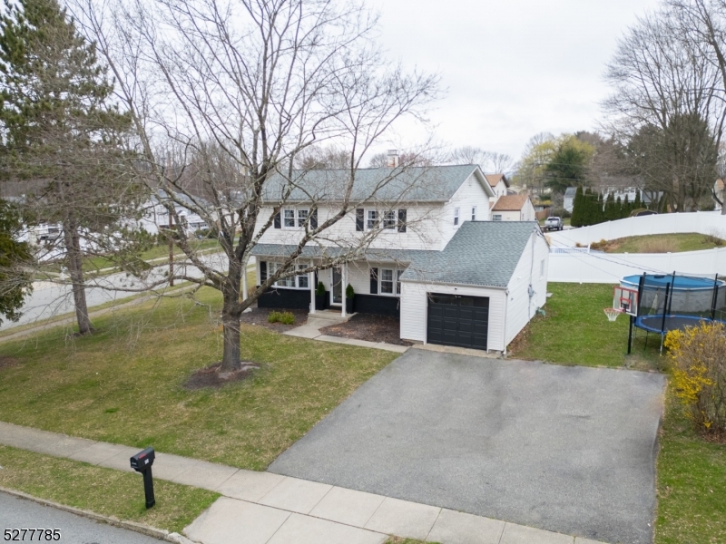 Welcome to your dream home nestled in the heart of Hackettstown! This stunning updated colonial BOAsts four bedrooms, one & a half baths, has an abundance of charm & character & is situated on a picturesque corner lot in one of the most sought-after neighborhoods in town. As you step through the front door, you are greeted by the warmth & character of this inviting home. With hdwd floors throughout, the spacious living room is bathed in natural light, creating a welcoming atmosphere for gatherings. The heart of this home lies in the recently updated kitchen, where style meets functionality. Featuring sleek countertops, stainless steel appliances & ample cabinet space. The adjoining dining area provides the ideal setting for intimate meals or parties. Adjacent to the kitchen is a cozy den/ office, perfect for relaxing w/ a good book or getting some serious work done. Upstairs, you'll find four generously sized bedrooms w/ plenty of natural light & ample closet space. The unfinished basement offers endless potential, whether you envision a home gym, workshop, or additional living space. Enjoy hosting summer barbecues, gardening, or simply relaxing in the beauty of your own backyard. Conveniently located near schools, parks, shopping & dining, this home offers the quintessential suburban lifestyle w/ all the amenities. Schedule your showing today & experience the beauty and charm of this exceptional property firsthand! SELLER REQUESTS ALL OFFERS DUE WED 4/3 BY 5 PM.