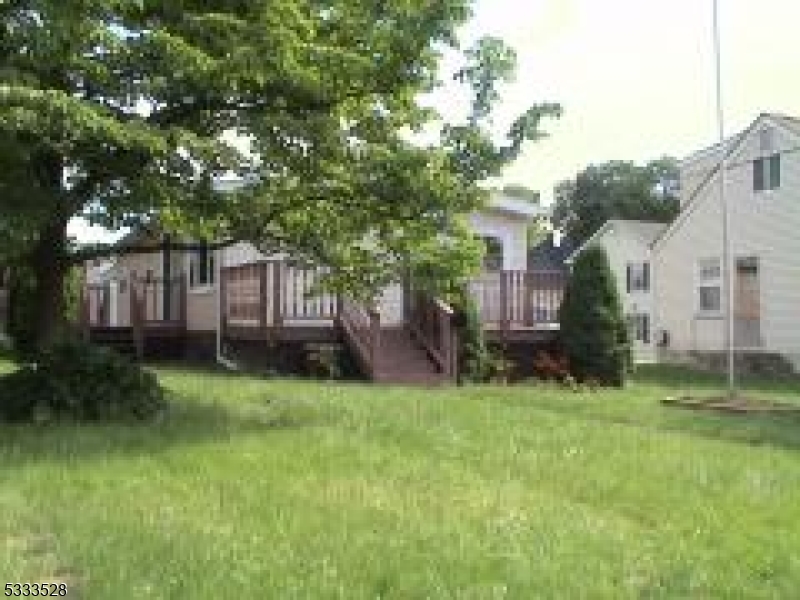 Ranch with two decks, parking in rear, two bedrooms, high ceiling living room/eat in kitchen.Sold as is.  Tenant occupied. Buyer is responsible for verifying any and all information regarding accuracy of any information contained herein. Buyer must conduct their own due diligence, verification, research, inspections and are relying solely on the results thereof. The buyers pay the transfer tax. Purchase as is with no repairs and buyers acquires the CO.