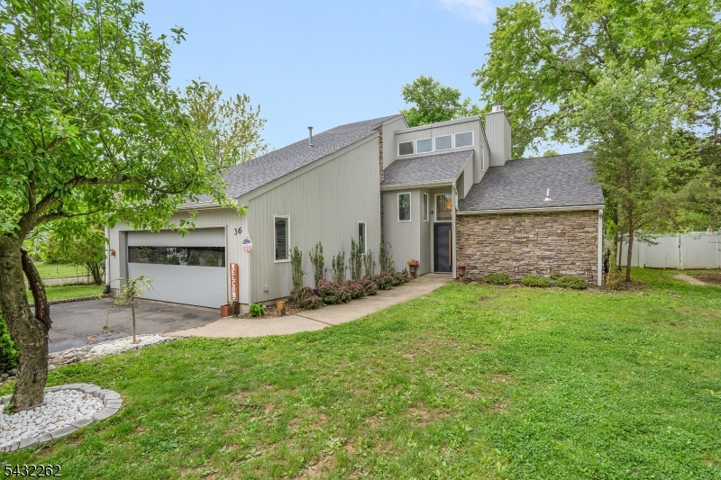 Custom-built contemporary offering the perfect blend of style, comfort, and modern updates! This beautifully maintained 3-bedroom, 2.5-bath home with a 2-car garage is loaded with renovations, improvements, and exceptional features throughout. The stunning first-floor primary suite serves as a private retreat, complete with a cozy fireplace, soaring vaulted ceiling, renovated bath, and oversized walk-in closet. The remodeled kitchen showcases granite countertops, stainless steel appliances, and opens seamlessly to the spacious breakfast/dining area   the ideal setting for everyday living, entertaining, and gathering with guests. Thoughtfully designed with an open, inviting layout and filled with custom details, this special home offers contemporary living at its finest.
