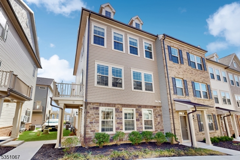 Experience sophisticated living in this amazing end-unit townhome, this 4 bed, 3.1 bath, 2 car garage is ready tobe yours!Built in 2022, sq/ft 2,000+(approximate), this contemporary designed unit boasts an open floor plan & important upgrades such as wallto wall hardwood floor on main level and all 4 bedrooms, granite countertop, KITCHENAID SSappliance(Refrigerator, Microwave & Oven-wall, 5 burner range, dishwasher), hood vent, huge center island, RO system, water softener. Up to second floor, there're 3 bedroom including Master suite with 2 WALK-IN closets, 2 vanity main bath and laundry room with LG washer & dryer. Ground fl you have the 4th bedroom and full bath, EV charge, ceiling storage rack in garage, everything is ready for you to MOVE-IN. Low HOA fee, great school system, Convenience to all shopping, dining area, easy for commuters to access bus & NJ Transit stations, and major highway.
