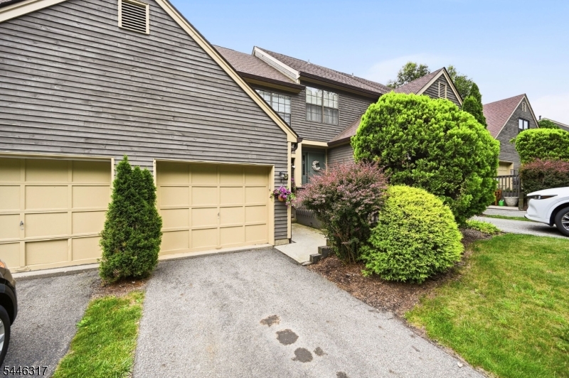 Welcome to Bald Eagle Village?s Dorchester model! This well thoughout  2 bedroom, 1.5 bath townhome features a beautifully updated kitchen with wood cabinetry, stainless steel appliances, a breakfast bar, and adjoining dining area. The dining area overlooks the formal living room below, creating an open and unique multi-level layout. This level also offers access to the one-car garage and a convenient powder room. The bright and inviting lower level living room is highlighted by soaring ceilings, abundant natural light, and a stone faced fireplace, along with sliders leading to the private deck. The lower level also includes a laundry and utility room, while a separate den off the living room offers flexible space for a home office, bar, entertainment area, or whatever best suits your lifestyle. On the top floor, the spacious primary bedroom and second bedroom each feature double closets and share a newly renovated hall bath with stylish tilework and a luxurious walk-in shower. A wonderful combination of space, character, and thoughtful updates, all spread across three distinctive levels. Schedule your showing today!