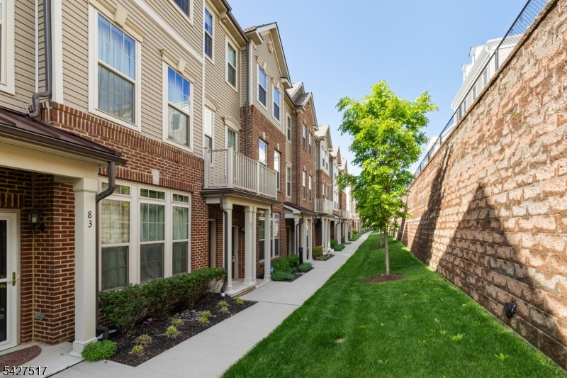 A beautifully upgraded 2 bedroom plus loft, 2 full and 1 half bath home located in the highly desirable LINK at Westmont. Built in 2022 & offering 1,771 SF of thoughtfully designed living space, enhanced w/ premium finishes & custom additions. The kitchen showcases higher-end KitchenAid appliances, a stunning marble backsplash, & elegant finishes that flow into a bright & open living area. Along w/ a balcony off the kitchen perfect for relaxing or grilling. Numerous improvements beyond the builder's standard features include vinyl flooring on the 2nd flr & stair treads, a built-out primary closet, high-end light fixtures, baseboard moldings, wainscoting, a mudroom bench, finished garage & a designer accent wall in the primary bedroom. Modern technology include a Ubiquiti network system w/ access points, Guardian managed security system w/ cameras & mechanical remote-controlled blinds. Builder upgrades from Pulte include an enhanced HVAC system w/ electronic air cleaner, zone dampener & humidifier, tray ceiling, luxury tile floors, tiled shower pan w/ built-in seat & soaking tub, double vanity guest bath & a garage hose bib. Offering valuable financial & long-term benefits; a tax abatement thru 2027 & a new construction structural warranty thru 2032, providing added peace of mind. Residents enjoy excellent amenities; guest parking, on-site shops, an athletic complex w/ baseball, soccer, pickleball, a dog park, playgrounds & close by tennis courts & Westmont Train Station.