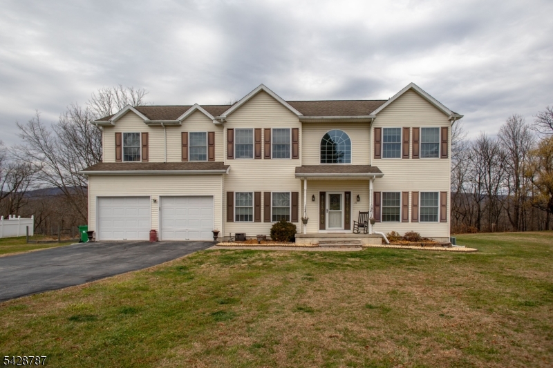 Welcome to this very Spacious Colonial.  This Center Hall Colonial is Warm and Inviting.  As you enter the Living Room is to the Right.  The Dining Room to the Left is perfect for Gatherings.  An open Concept Kitchen and Family Room are where most of your Day to Day living will be.  The Kitchen has all the right Ingredients; Granite, Stainless Appliances, Island and Space for Informal Dining.  Take in the View of "Sunrise Moutain" from the Deck.  Upstairs you will find a Large Primary with a Renovated Bathroom.  A Relaxing Ensuite.  There are 3 more Bedrooms, an ADDITIONAL Office/Bedroom and a Full Bath also Renovated.   The Basement is HUGE.  This could be a Finished Space if you wish. The Current Owners have really made this house a HOME.   Now it's time for you to make it YOURS.   County Records show a 4 Bedroom Septic.