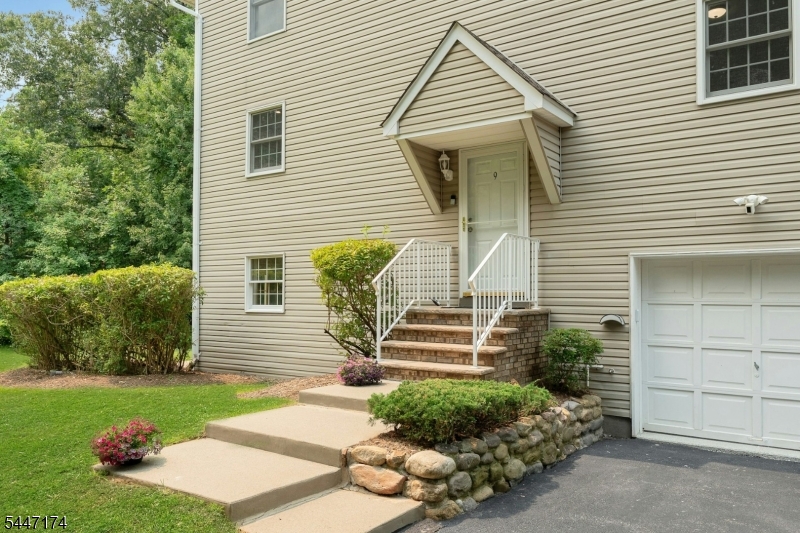 Beautifully updated 3 bedroom end unit townhome with 2 full baths and 2 half baths. The first thing you see when you drive up is the oversized driveway with room for 3 cars and the attached garage with built in overhead storage and a line for a tesla charger.  rare for any townhome. Just a few steps down leads to a flex room (perfect for media room, office or guest room) a powder room, tons of closet storage, garage entrance and walkout to the oasis like backyard with trees and a brook. The main level, only a few steps up from the foyer, has a spacious living room and dining room with another balcony. The updated eat in kitchen with pantry has been beautifully updated. A powder room completes this level. Upstairs are three bedrooms. The primary suite has a walk in closet with built ins and bathroom. There are two big bedrooms and a guest bathroom as well as laundry. Brookstone is the perfect starter home or for those looking to downsize. The bus to the highly rated schools (including Parsippany Hills High School) stops right in front of the complex. The community is well maintained offering a park like oasis just minutes from major highways, shopping and restaurants.