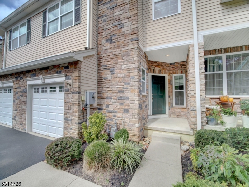 Beautiful Toll Brother's townhouse in desirable Morris Chase on cul-de-sac with plenty of guest parking. The first floor offers an open concept. The kitchen features sleek countertops, plentiful cabinet space, and  stainless steel appliances. The living room and dining room are perfect for comfort & entertaining and there is access to deck from dining area that overlooks tree lined backdrop. The laundry room & powder room are located near entry and are both spacious. The second floor features a true primary suite with large bedroom with plenty of room for a sitting area or home office space, two walk in closets and ensuite luxury bath with dual vanity, soaking tub and shower. Two other enerously sized bedrooms and main bath complete the second floor.  Step outside to your own private deck right off the dining room  The full finished walk out basement is perfect for rec room, entertaining or playroom. It has a separate storage room and has sliding doors to a private outdoor patio area to enjoy. Amenities include gorgeous clubhouse, outdoor pool, tennis, basketball & volleyball Courts & playgrounds. This is a commuter dream as it is located mins to Routes 206, 46, 80, 24, 10 and 287. A Must See!