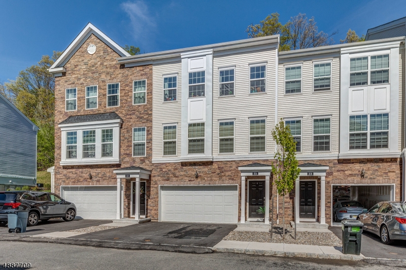 Better than brand new!  Less than a year old, 3 bedroom, 3,1 bath, 2 car garage Pinehurst townhouse is mint condition!  Open floor plan with kitchen open to living room & dining area, kitchen features granite countertops, stainless steel appliances, 42" cabinets.  Master bedroom suite offers a large walk-in closet & spa-like bath, 2 additional bedrooms & main bath.  Lower level has a family room.  Close to highways, transportation, shopping, & more!  Beautifully decorated, nothing to do but move in!!!