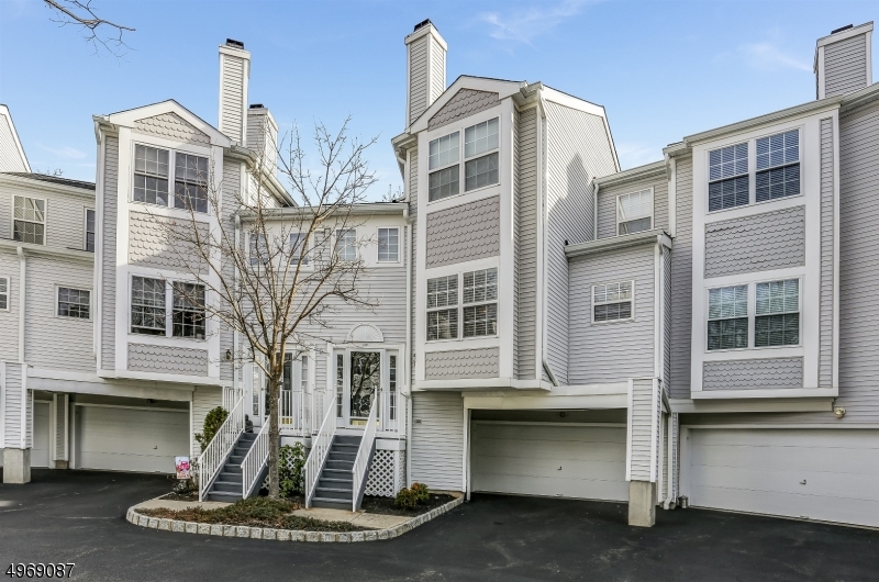 Multi-level 2 bedroom, 2   bath townhome in the desirable Oak Ridge Complex in Hanover Township.  Move right into this updated & bright unit with loft and finished lower level. Eat in granite & stainless kitchen with sliding glass door to private deck. Living room with fireplace & den off of kitchen.The second floor offers a spacious master bedroom suite with walk-in closets, master bath with soaking tub & double vanity, additional bedroom, a loft that can double as office or sitting area & hall bath completes this level of living. The finished walk-out lower level has a family room, laundry, & access to the 2 car garage.Township has a community center, before/after school programs. Low property taxes & excellent schools. Easy access into downtown Morristown & Convent train station.