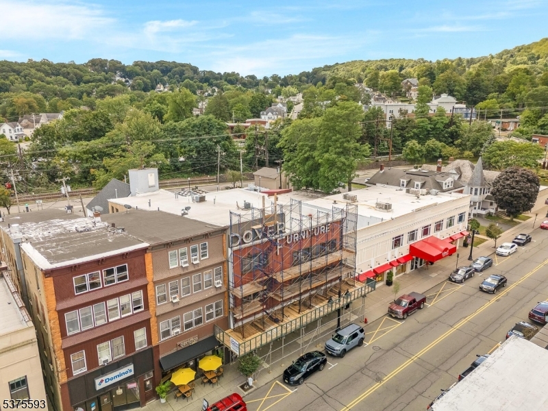 Located in the Historic Blackwell section of Dover. Building signage shows Dover Furniture - new to market, building includes 2 retail/office spaces occupied, 10 apartment [studio and/or one bedroom only]  units occupied, lower level hosts a place of worship. Limited in parking in the rear of building but adjacent to town public parking.