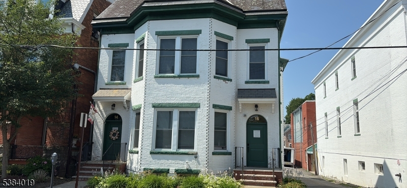Upgraded 3-story brick building ready for use change of continued as offices. Great investment opportunity. Possible owner/user, or change use to a variety of options permitted under T6 Core zoning standards. Duplex converted to offices by Sussex County in the 1960's to professional office. Renovated in 2007, with additional work in 2017, 2019 & 2021. Computer switching system creates secured individual offices. New mini split HVAC and natural gas boiler. Easily split for owner/user, multiple professional use tenant, daycare, senior care, multi-family or mix use. Spring Street, Sussex County Courts, Administration Buildings, Sussex Community College, Thor Labs and Newton Medical Center. First floor tenant vacating July 2026 - perfect opportunity for owner/user with supplemental 2nd&3rd floor income.