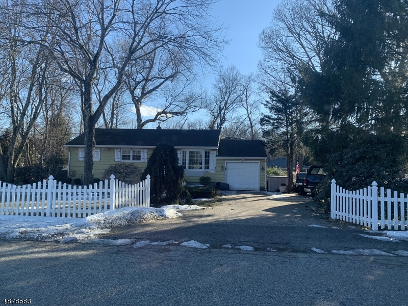 2 bed 1 bath-3 bedroom septic- on .46 level acre.  HW floors on 1st fl, CA, full house generator, Updated bathroom. Full finished basement with office, laundry/utility rm, workshop.Anderson & Pella windows, newer gutters and chimney liner, Surrounded by upscale  homes and subdivisions. Beautiful fully fenced yard with paver driveway, bluestone patio, gazebo,  8x10 shed, ornamental trees and bushes,  Home was a 3 bedroom- renovated for a larger master. Underground oil tank to be removed at sellers expense before closing.