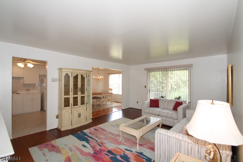 Welcome to this well-maintained 3-bedroom, 2-bath condominium offering a comfortable blend of space, functionality, and convenience. Natural light fills the home throughout the day, creating a warm and inviting atmosphere. The spacious eat-in kitchen opens to the main living area, while the generously sized living room provides direct access to a private deck, an ideal spot to enjoy your morning coffee or unwind after a long day.The unfinished basement features high ceilings and offers endless possibilities for additional storage, a home gym, workshop, or future finished living space, subject to local requirements.Conveniently located just minutes from major highways, shopping, restaurants, and everyday amenities, this home offers easy access while being tucked away in a quiet, well-maintained community. Residents enjoy beautifully landscaped grounds, a community pool, and a playground. Two assigned parking spaces and ample guest parking add to the home's everyday convenience.Located in desirable Morris County, this home also benefits from relatively low property taxes and HOA dues, making it an excellent opportunity for buyers seeking both value, location, and easy access to NYC.