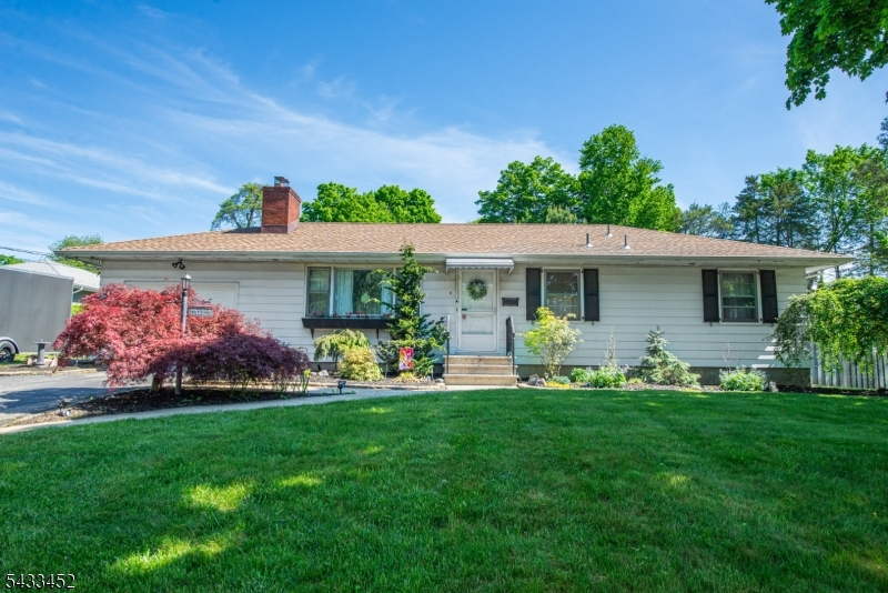 Welcome to this quaint neighborhood located in the heart of Kinnelon. This charming cozy 3 Bedroom 2 full Bath Ranch with a functional layout can be customized to make it your own and present an opportunity for a long time potential all in one.This home offers hardwood floors throughout, warm wood finishes, natural light that flows through the cozy living room with a fireplace. A Rustic Eat in Kitchen with Rustic Cabinets.The Adjoining Family Room off the Kitchen overlooks the Backyard surrounded by nature, plantings and an outdoor in ground 20x40 Gunite swimming pool. 2 wood shed for storage. There is a Full basement with access from the Family Room and a Bilco door access. This property offers a prime location for easy access to major highways, dining, shopping, parks and local schools.