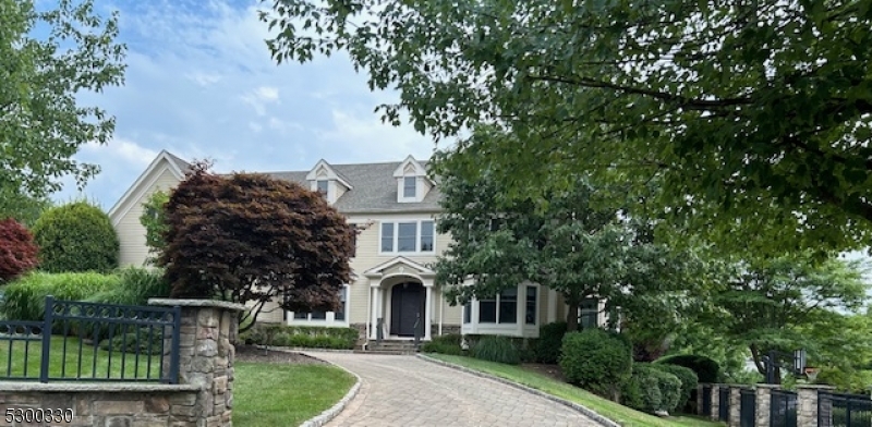 NEWEST Street in RIKER HILL! 5100+ Sq ft of Living Space + Finished Basement in this 6 Bedroom 4 1/2 Bath Custom Colonial Located on .87 Acres in one of Livingston's Most DESIRED neighborhoods. Cozy Family Room with Gas Fireplace is open to Custom Renovated Kitchen with a large quartz center Island, Breakfast Bar, SS appliances & Separate Eating Area overlooking the inviting pool. 2nd Level Hosts TRUE MASTER SUITE w/2 Walk-in Closets, Sitting Room/Office & SPA Like En-suite Bath. Add'l 4 bedrooms + 3 Full Bathrooms (including a Jack & Jill and 2 En-suite Bathrooms). FINISHED Basement w/Rec Room, Full Bath & tons of storage. Close proximity to TOP RATED Schools, Shopping and Restaurants. MOVE RIGHT IN and ENJOY LUXURY Living at its finest!