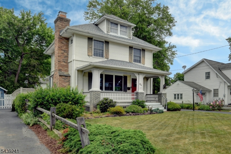 Old World Charm Colonial with huge lemonade front porch. Hardwood floors throughout. Nice built-ins. Wood burning fireplace in living room. Recently updated kitchen and half bath. First floor features 9 foot ceilings, large living room and large dining room with bay window, a window seat and plantation shutters. French doors lead off dining room into sunroom. Sliders are from sunroom to outside patio. There is an updated kitchen and separate eating area. All appliances included. Anderson windows throughout. 2nd floor features 3 bedrooms, one with a walk-in closet and a full bath. There is a finished walk-up attic, fully carpeted. Home features newer central air and furnace, only 2 years old, natural gas, public sewer and water. Full basement has nice finished family room and wonderful Dutch Fireplace. Work bench area, laundry and storage area. Lots of storage throughout and plenty of built-ins. Nice touches throughout the home. Detached 2-car garage. Wonderful area. Prime location of town. Close to parks, schools, restaurants, shopping, highways and transportation. Walking distance to schools and places of worship. There is a town lake for swimming and fishing, a golf course, and a bike/pedestrian walking path. Easy commute to NYC.