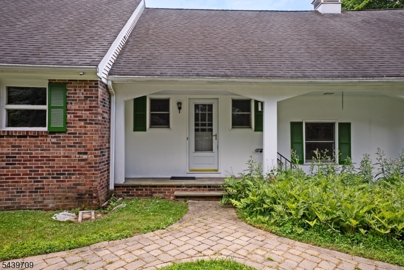 Create the life you want, renovate or reimagine in a coveted location. Cape Cod presents an opportunity to create an environment that aligns with how you want to live. Set on a level lot on the eastern side of town, the location supports an easy, connected lifestyle with access to schools, transportation, and the Morristown area. The existing home requires significant renovation, offering a blank canvas for thoughtful redesign lending itself to a modern layout, including the potential for a first-floor primary suite, along with three additional bedrooms upstairs. The second-floor attic spaces provide an opportunity to expand square footage without changing the home's footprint ideal for a home office, studio, or quiet retreat. For those seeking a broader transformation, the property also supports new construction. Renovate to suit your vision or start fresh and design a home tailored to your exact needs and preferences.  Property highlights: level lot with room for outdoor living, recreation, or future landscaping; Well water, with public water available at the street; Underground electric service for a clean, unobtrusive streetscape; attached two-car garage with direct entry for everyday convenience; detached 2+ car garage offering additional space for vehicles, storage, or hobbies. Whether renovating, expanding, or building new, this property offers flexibility, location, and the chance to create a home that supports your lifestyle now and into the future.