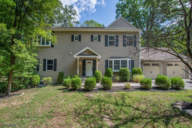 Built in 2006!! This Spectacular & Beautifully Appointed 4 BDRM Center Hall Colonial is nestled on a dead end in desirable Cedar Lake. Flowing, classic layout great for entertaining. Formal living room. Updated kitchen w/granite counters, stainless steel appliances, center island & gas cooking which opens to the sun-filled dining room - could be used as eating area/living area (Please look at pictures from previous listing to see the set up). Perfect space to host all your events! Sliders walk out to the trex deck & fenced in yard. Convenient powder room. Gorgeous HW flooring & neutral colors throughout. High ceilings & high hat lighting. Upstairs 4 large bedrooms including a master which boasts 2 closets & an en-suite. Walkout BSMT - bonus living & storage. Large garage provides even more storage. Newer washer, dryer & boiler. Situated in a private location with easy access to all life's conveniences! Short walk to Cedar Lake Clubhouse & beach! Just minutes to public transportation -NYC-Direct train & bus, major highways, grocery store & great restaurants/shopping in Downtown Denville.