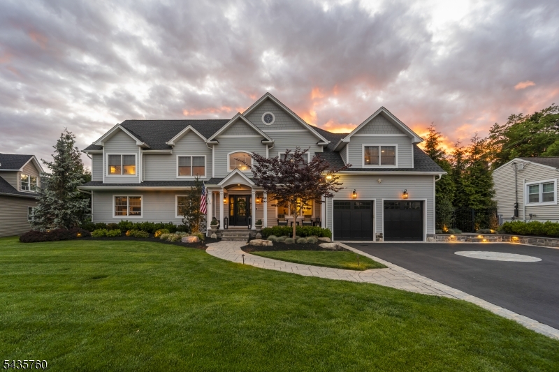 Welcome to 11 Amelia Drive in Old Tappan - a fully upgraded smart luxury residence designed for elevated everyday living and exceptional entertaining. This meticulously customized home blends sophisticated indoor spaces with resort-style outdoor amenities, featuring a heated pool and spa with waterfalls, landscape lighting, outdoor speakers, in-ground trampoline, designer landscaping, dog run, and a stunning Trex deck anchored by a four-season smart pergola with recessed lighting, heaters, fans, and motorized retractable screens for effortless indoor-outdoor living. The outdoor kitchen includes dual refrigerators, sink, built-in side burner, gas fireplace, and 65" outdoor TV for seamless entertaining. Inside, enjoy custom window treatments, motorized foyer chandelier lift, Sonos theater surround sound, smart environmental controls, Samsung smart appliances, and bifold ORIGIN doors opening effortlessly to outdoor living spaces. The finished lower level offers recreation and fitness areas complete with gym equipment, air hockey, foosball, and media lounge. Additional highlights include a full-house generator, security system, whole-house water filtration and water softener systems, sprinkler system, leaf-free gutters, heated/cooled garage, and premium smart home technology throughout.