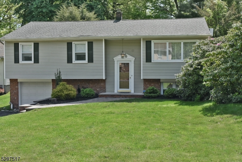 Nestled within White Meadow Lake, this 4 bed 2 bath Bi-Level residence offers a delightful blend of comfort, style, and functionality. A meticulously crafted paver walkway sets the stage for the inviting atmosphere that awaits within. The convenience of a one-car garage is complemented by a lengthy driveway, ensuring ample parking space for multiple vehicles a rare find indeed. Enter through the front door and be greeted by a graceful formal l/r, adorned with natural light and accentuated by gleaming hdw floors a perfect space to welcome guests or unwind after a long day. Adjacent, the formal d/r sets the scene for memorable gatherings and intimate dinners. Continuing through, the heart of the home reveals itself in the form of a cozy f/r, where a wood-burning fireplace creates a focal point, inviting you to relax and unwind in its comforting glow. French doors connect this space to the formal d/r, offering versatility and an open flow perfect for entertaining. The well-appointed kitchen beckons with a breakfast bar and double sink, making meal preparation a joyous affair. From here, step outside to discover your own private oasis a tranquil paver patio awaits in the backyard, providing an idyllic setting for outdoor dining or basking in the sun. Retreat upstairs to find the m/b, complete with a full bath for added convenience and privacy, while 3 additional bedrooms offer ample space for rest and relaxation. Gas in street.