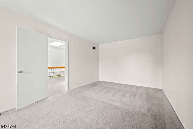 Sun-drenched and move-in ready, this stunning corner townhome in the sought-after Cedars community checks every box. Soaring cathedral ceilings and an open floor plan create an airy, welcoming feel the moment you walk in.A convenient mudroom, powder room, washer/dryer area, and direct garage access round out the main level beautifully. Upstairs, two generously sized bedrooms each feature their own private en-suite bathroom. An open loft with skylights floods the space with natural light ideal as a home office. Need storage? The full basement has you covered.Step outside to your private deck and enjoy the beautifully manicured surroundings. As a Cedars resident, you'll have access to a resort-style amenity package including a swimming pool, tennis and basketball courts, scenic bicycle paths, a playground, and a clubhouse all included in the rent.
