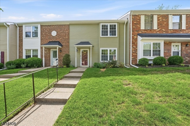 Located in the highly sought-after Deer Run Golf & Tennis Club, this spacious and move-in-ready 2-bedroom townhome offers 1,628 sq ft of light-filled living space and resort-style amenities. The open floor plan, featuring new floors throughout, includes a dining area that flows into the living and sun rooms, with sliding glass doors leading to a private outdoor area overlooking a beautiful tree-lined setting. As one of the largest 2-bedroom models in the community, this home is ideal for entertaining, offering a first-floor powder room, generous storage throughout, and convenient second-floor laundry. Upstairs features a large primary suite with dual closets and a spacious bath, plus a second en-suite bedroom with a walk-in closet. Residents enjoy access to golf, tennis, pool, and beautifully maintained grounds, all conveniently located near major highways, NJ Transit, shopping, dining, and parks. A rare opportunity to own in one of Lincoln Park's premier communities.