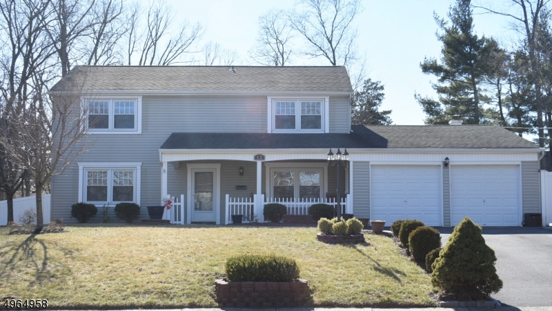 Covered "rocking chair" porch welcomes you to this well-maintained home w/an easy flow through living area. Updated EIK offers lots of cabinets & counter work space, SS refrigerator & electric range w/double ovens & built-in desk. Sliding door surrounded by side lights leads to private, fenced backyard w/paver patio & two storage sheds. Enjoy leisure time in  above ground pool w/deck & newer (2019) liner. Highlights: Laminate wood floors throughout first floor, upstairs hallway & second bedroom, wainscoting in lower & main hallways & stairway. All baths updated/renovated. Vinyl siding & roof 2005. Newer windows 2017. HVAC replaced 2009. Close to major highways, trains/buses to NYC, Rutgers University, top-rated medical facilities, downtown New Brunswick featuring the New Brunswick Performing Arts Center.