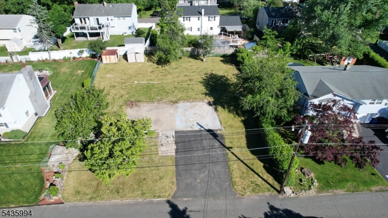 Rare opportunity to build your dream home in desirable Hopatcong! This residential lot comes with approved architectural plans and township permits, saving valuable time and expense in the building process. Plans are designed for a stunning custom colonial featuring approximately 2,500 square feet of living space, 4 bedrooms, 2.5 bathrooms, and a 2-car garage. The property is conveniently located near Lake Hopatcong, parks, shopping, dining, and major commuting routes. Whether you're a builder, investor, or future homeowner, this shovel-ready lot offers the perfect opportunity to begin construction immediately. Buyer to perform their own due diligence and verify all approvals and permits with the Township of Hopatcong.