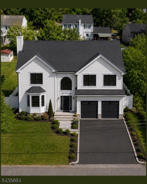Rare opportunity to build your dream home in desirable Hopatcong! This residential lot comes with approved architectural plans and township permits, saving valuable time and expense in the building process. Plans are designed for a stunning custom colonial featuring approximately 2,500 square feet of living space, 4 bedrooms, 2.5 bathrooms, and a 2-car garage. The property is conveniently located near Lake Hopatcong, parks, shopping, dining, and major commuting routes. Whether you're a builder, investor, or future homeowner, this shovel-ready lot offers the perfect opportunity to begin construction immediately. Buyer to perform their own due diligence and verify all approvals and permits with the Township of Hopatcong.