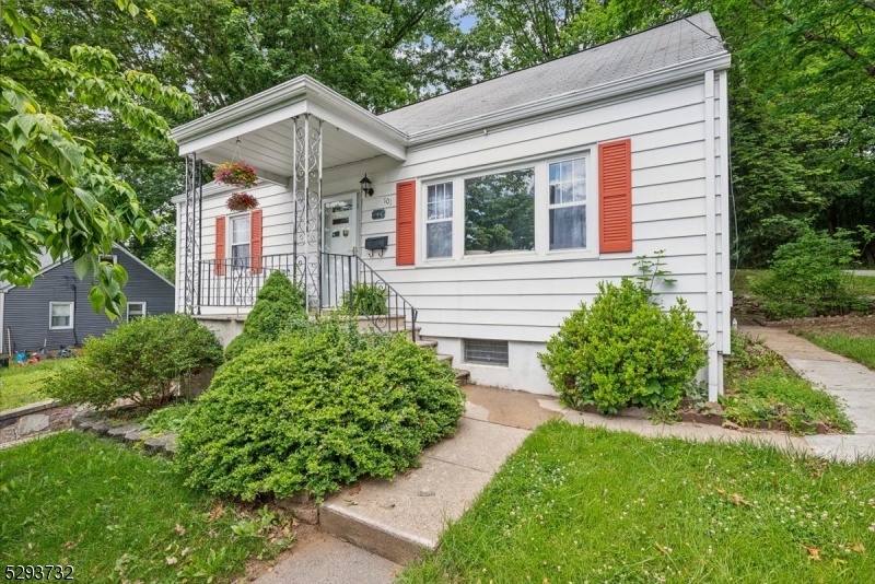 Spacious & Charming in an Excellent Location! Imagine coming home to this fantastic Expanded Cape Cod home set on a corner lot in a quiet residential neighborhood just blocks away from Rockaway Twp schools, easy access to shopping, dining, parks, major highways and NYC direct train. This home has all the charm of a traditional Cape, but with an amazing amount of living space. Walk through the front entry to the sun-filled living room and continue to the spacious eat-in kitchen. Just off the kitchen, you find the formal dining room with large windows to the backyard and vaulted ceilings with skylights; this is part of the expansion of this home. Exit the dining room to the 3-season room, with access to the private backyard with patio and storage shed. On the main level you will find the main full bathroom, one large bedroom and 4th bedroom. Upstairs you have two bedrooms, one of which is a sizable primary bedroom that runs the full depth of the house and the back half of the rooms is dormered, leaving tons of truly usable living space. Between the two bedrooms you will find another full bath. In the basement, you have access to the oversized one-car garage, laundry, storage and a bonus/flex room with a full bath, great for additional living space, guest room or family room.