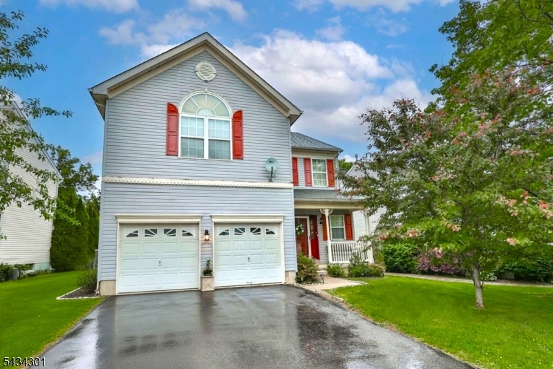 Welcome to a beautiful home in a perfect location! Desirable Greenwich Chase 2,542 sq.ft. colonial completely updated during ownership. Carpeting has been replaced with gleaming hardwood on all first and second floors. Original linoleum has been replaced with neutral tile. New granite countertops in kitchen, double sink, all stainless appliances, electric stove converted to gas. New roof 2020, A/C 2023, and furnance 2024. Ceiling fans in kitchen, family room, and all four bedrooms. Powder room and laundry room on first floor. Two full baths on second floor and one full bath in basement. Prime suite has cathedral ceiling, walk-in closet, while the prime bath has double sinks, soaking tub and shower. Family room has a dramatic vaulted ceiling. Additional 700 sq.ft. of living space in finished basement with second kitchen, full bath, recreation/exercise area, and separate room for office or play.  Two-car garage. Low ANNUAL HOA fee of $330 covers common areas " multiple parks, tennis courts, walking paths. Commuter convenience at its best near I78, shopping, and restaurants.