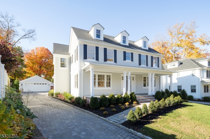 Welcome to 135 Green Village Road, an exquisite new construction in Madison, NJ, crafted by the renowned local builder WP Lloyd. This stunning home seamlessly blends modern elegance with thoughtful architectural planning by Kim Tone and sophisticated design by Katy Patterson from TLA Designs. The 6,102 square foot residence boasts six generously sized bedrooms, five full baths, and a stylish half bath, ensuring ample space and privacy for all. The home's modern design elements are evident in its clean lines and open spaces, creating an inviting atmosphere for both relaxation and entertaining. The interior is bathed in natural light, enhancing the contemporary aesthetic and highlighting the high-quality finishes throughout. Situated on a .41-acre lot, the property provides a serene outdoor space that complements the luxurious interior. Its prime location offers convenient access to the vibrant town center, train station and schools making it an ideal choice for those seeking both tranquility and connectivity. Experience the perfect balance of modern living and timeless elegance at 135 Green Village Road, where every detail has been meticulously crafted to offer a truly exceptional lifestyle.