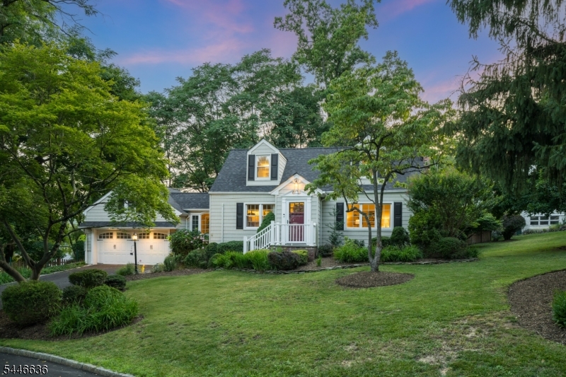 BEAUTIFUL CLASSIC 3 BED/2 BATH CAPE MINUTES FROM MORRISTOWN GREEN! Nestled on a gentle curve of quiet Sherman Place, this cheerful Cape Cod has curb appeal & charming details blended with modern updates. Step inside the quaint Wm. Morris-papered entryway & immediately appreciate newly refinished oak hardwood floors, beautiful archways, sun-filled mullioned windows, built-ins & a cozy brick fireplace in the Living Room recently converted to user-friendly gas. Upgraded Kitchen just off the bright & welcoming Dining Room boasts granite countertops, white cabinetry, subway tile backsplash & SS appliances like Bosch gas range. Next to the Kitchen sits a warm Den area that just needs a doorway installed to provide easy access from the attached 2-car Garage. French sliding doors lead to the amazing fenced-in Backyard with care-free Trex deck, two storage sheds, mature gardens & a large corner lot offering privacy. A Bedroom & Full Bath round out the 1st Level, both facing the serene Backyard. The 2nd Level has two spacious Bedrooms with windows on three sides, good closet space & shared Full Bath in between. Walk-out Lower Level offers carpet, painted beadboard wainscoting, Laundry/Storage Room & great flex space. Large Rec Room with nook for crafts or games, plus separate room with closet space, perfect for an exercise room or home office! Brand-new furnace, newer roof & efficient mini-splits throughout!