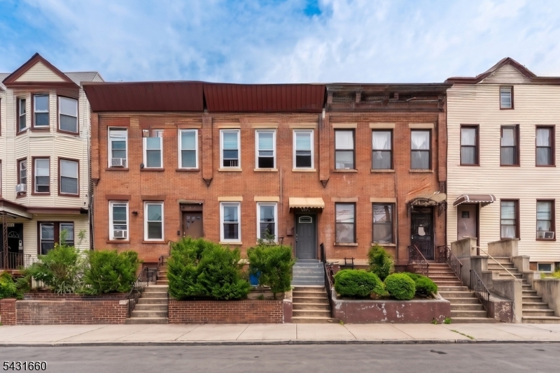 Rare opportunity to own a spacious two-family brick home in Jersey City's desirable West Bergen neighborhood. This versatile property offers strong income-producing potential or the option to occupy one unit while renting the other. Each unit features bright and inviting interiors with generously sized living areas, hardwood flooring, high ceilings, large windows, and updated kitchens with ample cabinetry and counter space. The upper unit offers an expansive layout with multiple bedrooms, updated baths, and open living/dining flow filled with natural light. The lower level includes additional finished living space with a separate kitchenette and full bath, providing flexible-use options. Both units offer comfortable layouts with modern updates while maintaining classic Jersey City charm. Enjoy private outdoor space with a fenced backyard/garden area ideal for relaxing or entertaining. Additional highlights include separate entrances, recessed lighting, abundant storage, and functional layouts throughout. Conveniently located near parks, shopping, restaurants, schools, houses of worship, and public transportation with easy access to Journal Square, NYC buses, and major highways.Excellent opportunity for investors or owner-occupants seeking value and flexibility in one of Jersey City's most convenient and rapidly growing neighborhoods.
