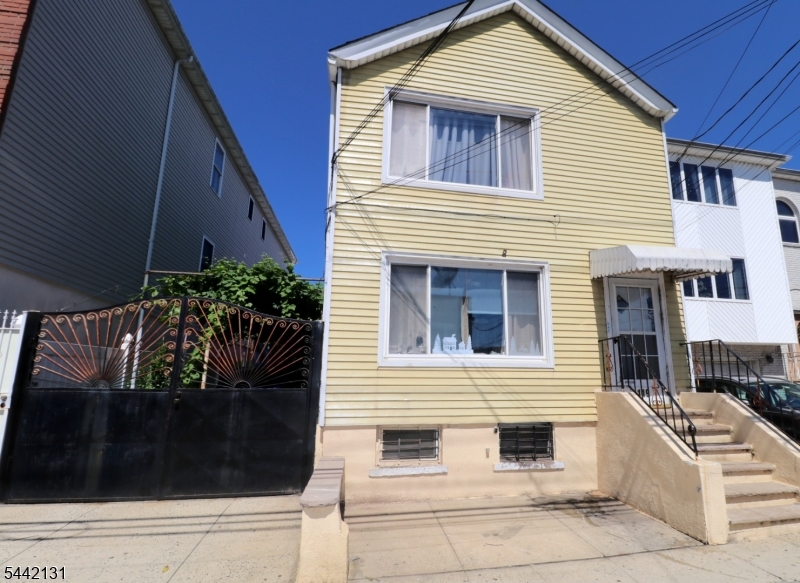 Welcome to 119 Pacific Street!This fantastic, well-maintained two-family home is ideally located in the highly sought-after and vibrant Ironbound section of Newark. Offering spacious and versatile living arrangements, this property is perfect for both owner-occupants and investors alike.The first-floor unit features a generous kitchen, a comfortable living room, three spacious bedrooms, and a full bathroom. The second-floor unit offers a similar layout with a large kitchen, living room, three bedrooms, and two full bathrooms, providing ample space and flexibility.Additional highlights include a finished basement, separate utilities, a large driveway, and a detached garage, ensuring convenience and plenty of parking.Enjoy being just moments from the Ironbound?s renowned restaurants, shopping, parks, major highways, and public transportation, making for an easy commute to New York City.Don't miss this incredible opportunity to own a versatile multi-family property in one of Newark's most vibrant and growing communities!