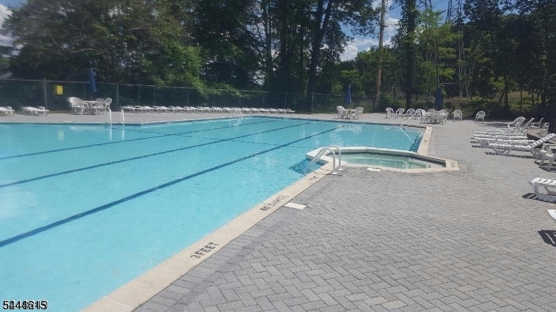 Welcome to this beautifully renovated 2-bedroom condominium located in the highly desirable Mountain Club community in Morris Plains. Completely updated in 2021, this spacious and move-in-ready home features a bright, open layout with modern finishes throughout, offering the perfect blend of style and comfort.The oversized living and dining areas provide plenty of space for entertaining or relaxing, while the updated kitchen and bathroom showcase contemporary design and quality craftsmanship. Both bedrooms are generously sized with ample closet space, making this home ideal for homeowners and investors alike.Nestled in a peaceful, park-like setting, residents enjoy beautifully maintained grounds and an array of community amenities, including a swimming pool, tennis courts, fitness center, and walking paths. Conveniently located just minutes from major highways, NJ Transit, restaurants, shopping, and downtown Morristown, this home offers the perfect balance of tranquility and accessibility.Don't miss this opportunity to own a beautifully updated home in one of Morris Plains' most desirable communities.
